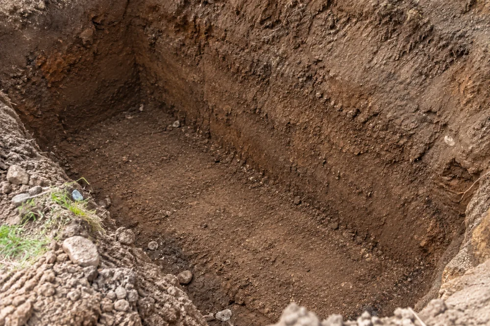 After: oil tank removed, clean excavation ready for backfill